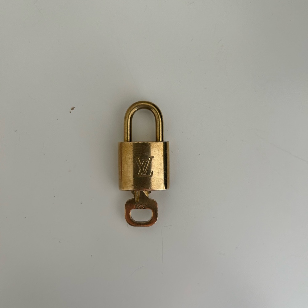Louis Vuitton lock and key number 323